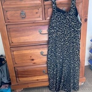 1. State Women’s navy blue and white geometric jumpsuit, size large EUC